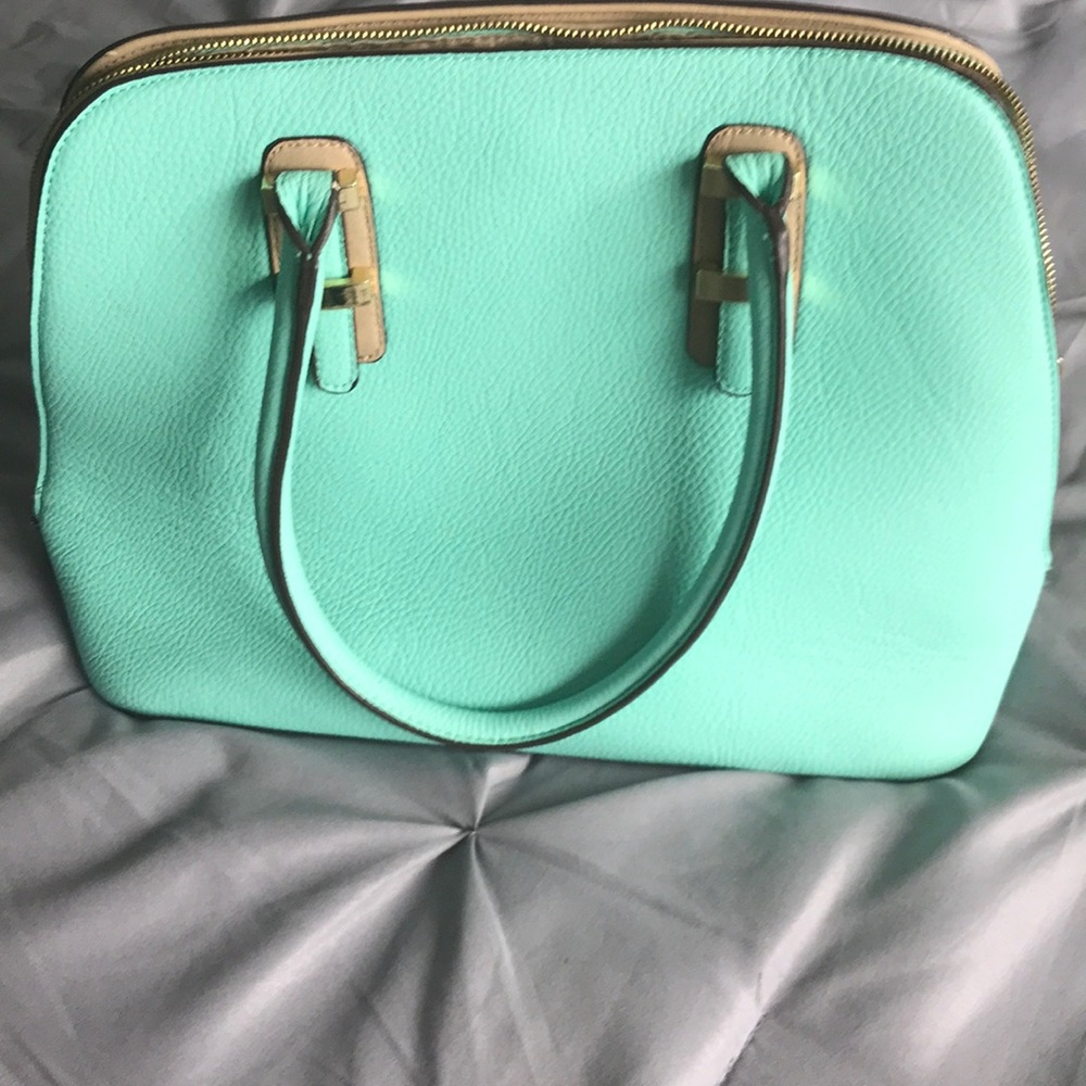 Aqua Purse with lots of compartments. Approx 10”tall x16wide